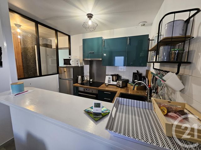 Afficher la photo en grand Appartement à vendre - 3 pièces - 43.0 m2 - DONVILLE LES BAINS - 50 - BASSE-NORMANDIE - Century 21 Royer Immo